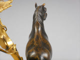 A Pair of Louis XV Gilt Bronze Candelabra
