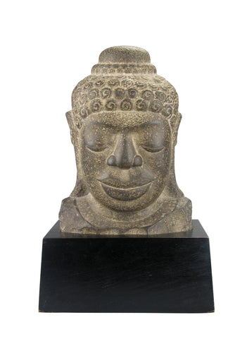 A Khmer Stone Head of a Buddha