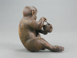 A Japanese Carved and Painted Monkey
