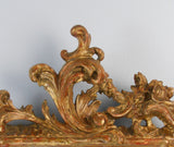 A Pair of Rococo Giltwood Mirrors